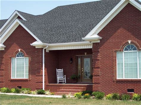 what color metal roof goes with red brick house|driftwood shingles on red brick.